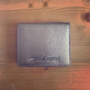 Bronze Michael Kors mini wallet